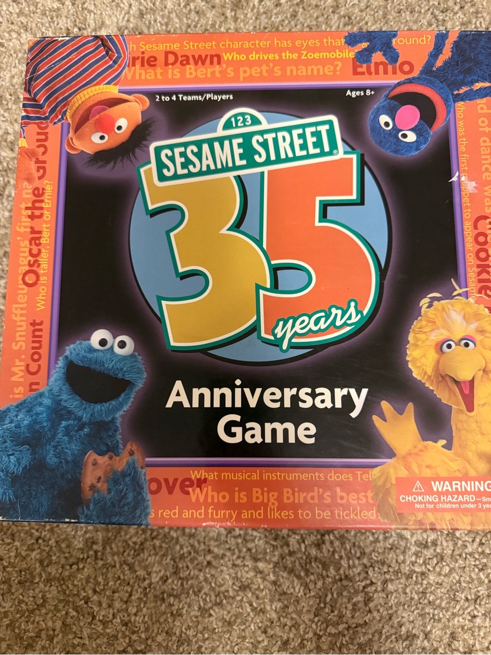 Sesame Street Anniversary Game Box with Blue, Yellow, Red, Green Accents